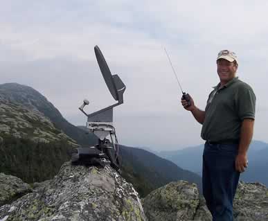 Phillip/AK1H standing by the 10GZ dish high at the top of Mt Mansfield.